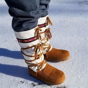 Steger MukLuks Arctic Moosehide Leather Tall Boots With Lace Around Ribbon.